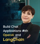 The Build Chat Applications with OpenAI and LangChain course creator stands in a modern office setting with the text 'Build Chat Applications with OpenAI and LangChain' on the left side of the image.