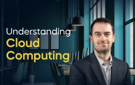 The Understanding Cloud Computing course creator stands in a modern office setting with the text 'Understanding Cloud Computing' on the left side of the image.