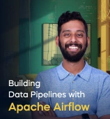The Building Data Pipelines with Apache Airflow course creator stands in a modern office setting with the text 'Building Data Pipelines with Apache Airflow' on the left side of the image.