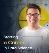 The Starting a Career in Data Science: Project Portfolio, Resume, and Interview Process course creator stands in a modern office setting with the text 'Starting a Career in Data Science: Project Portfolio, Resume, and Interview Process' on the left side of the image.