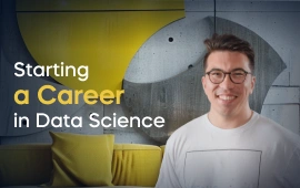 The Starting a Career in Data Science: Project Portfolio, Resume, and Interview Process course creator stands in a modern office setting with the text 'Starting a Career in Data Science: Project Portfolio, Resume, and Interview Process' on the left side of the image.