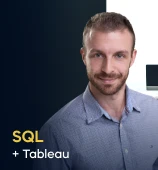 The SQL + Tableau course creator stands in a modern office setting with the text 'SQL + Tableau' on the left side of the image.