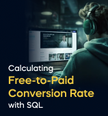 A woman with a laptop, with the text 'Calculating Free-to-Paid Conversion Rate with SQL Project' on the left side of the image